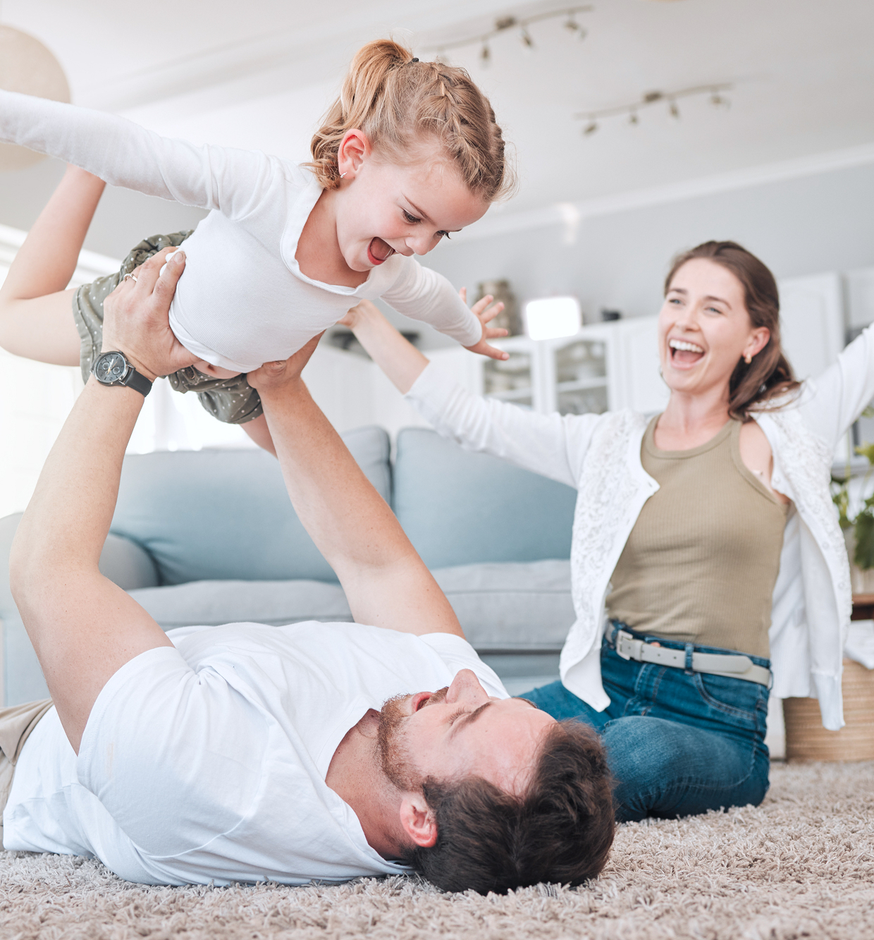 A family enjoying time together in their living room